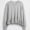 Maglione da bambino con peplo dal taglio morbido