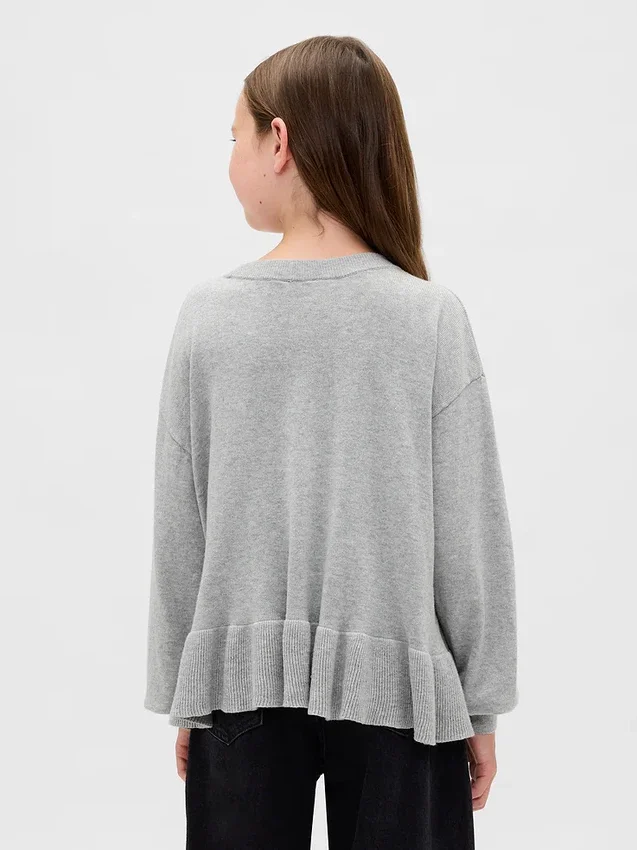 Maglione da bambino con peplo dal taglio morbido