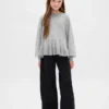 Maglione da bambino con peplo dal taglio morbido