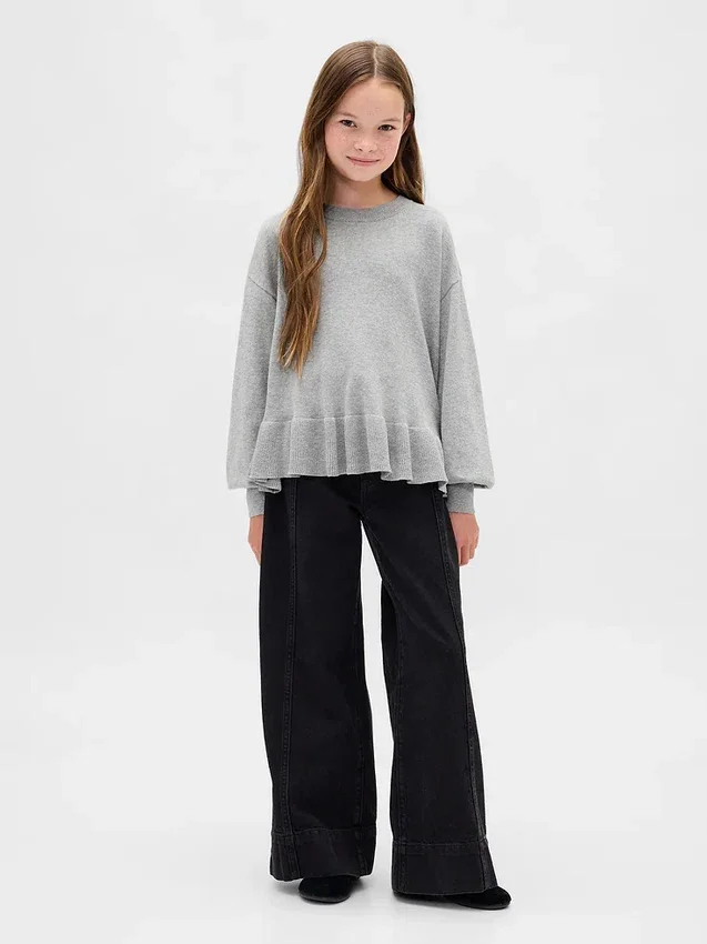 Maglione da bambino con peplo dal taglio morbido