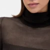 Maglione lungo in maglia trasparente con collo alto