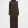 Maglione lungo in maglia trasparente con collo alto
