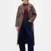 Maglione trasparente a collo alto