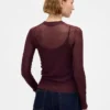 Maglione trasparente a collo alto