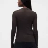 Maglione trasparente a collo alto