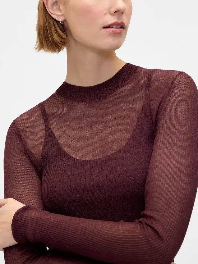 Maglione trasparente a collo alto