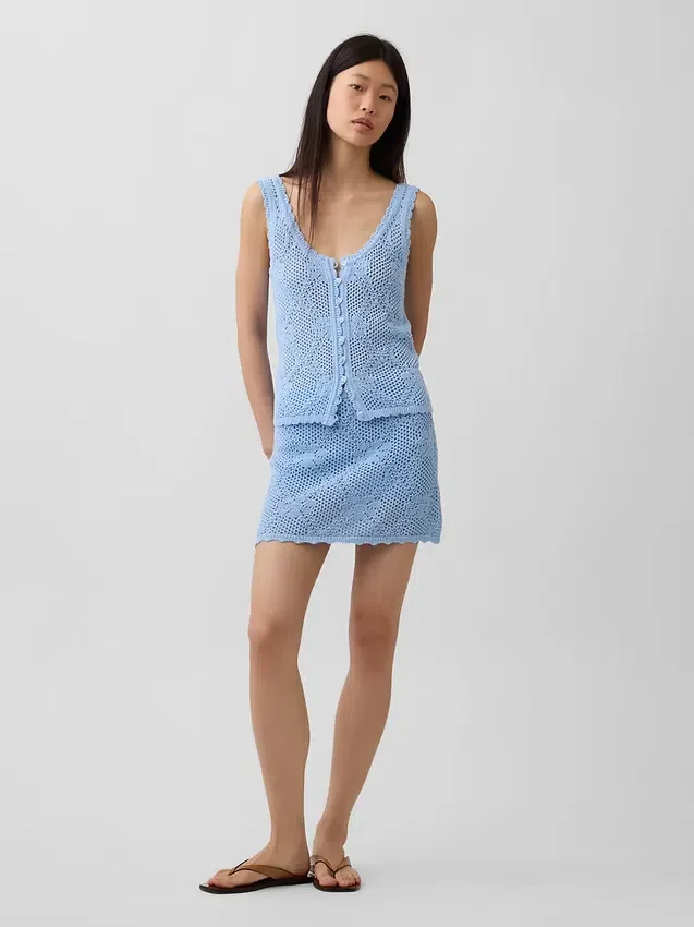 Mini gonna-maglione in cotone 100% con motivo pointelle