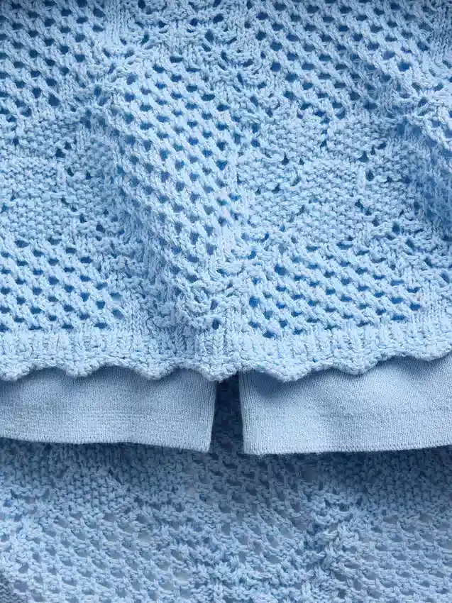 Mini gonna-maglione in cotone 100% con motivo pointelle
