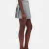 Mini gonna-pantaloncino a pieghe