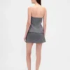 Mini gonna-pantaloncino a spina di pesce
