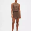Mini gonna-pantaloncino con bottoni sul davanti in misto lino