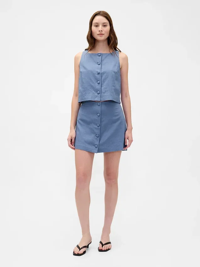 Mini gonna-pantaloncino con bottoni sul davanti in misto lino