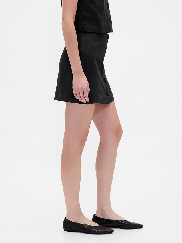 Mini gonna-pantaloncino con bottoni sul davanti in misto lino