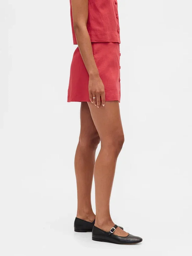 Mini gonna-pantaloncino con bottoni sul davanti in misto lino