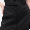 Mini gonna-pantaloncino con bottoni sul davanti in misto lino