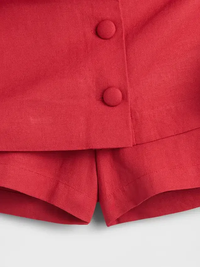 Mini gonna-pantaloncino con bottoni sul davanti in misto lino
