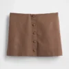 Mini gonna-pantaloncino con bottoni sul davanti in misto lino