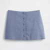 Mini gonna-pantaloncino con bottoni sul davanti in misto lino