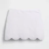 Mini gonna-pantaloncino con occhielli