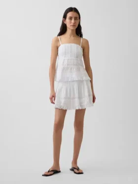 Mini gonna-pantaloncino facile da indossare con bordi in pizzo e pieghe
