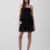 Mini gonna-pantaloncino facile da indossare con bordi in pizzo e pieghe