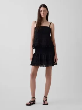 Mini gonna-pantaloncino facile da indossare con bordi in pizzo e pieghe