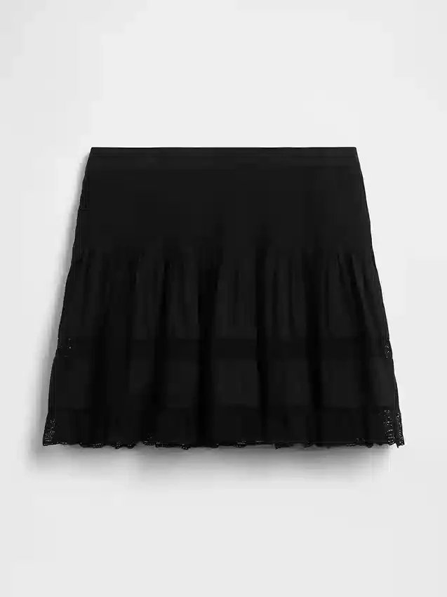 Mini gonna-pantaloncino facile da indossare con bordi in pizzo e pieghe