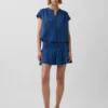 Mini gonna-pantaloncino in denim di garza di cotone con vita smockata
