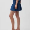 Mini gonna-pantaloncino in denim di garza di cotone con vita smockata