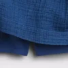 Mini gonna-pantaloncino in denim di garza di cotone con vita smockata