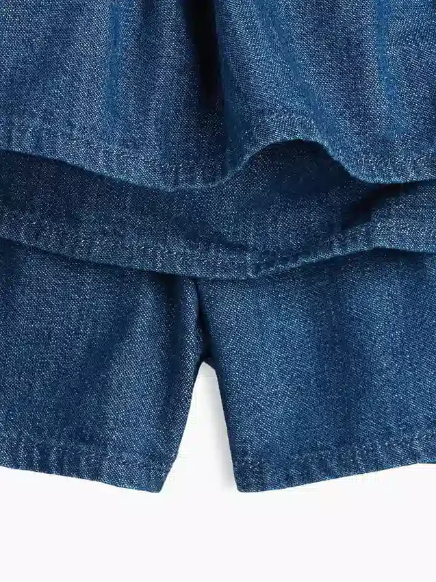 Mini gonna-pantaloncino in denim per bambini con smock