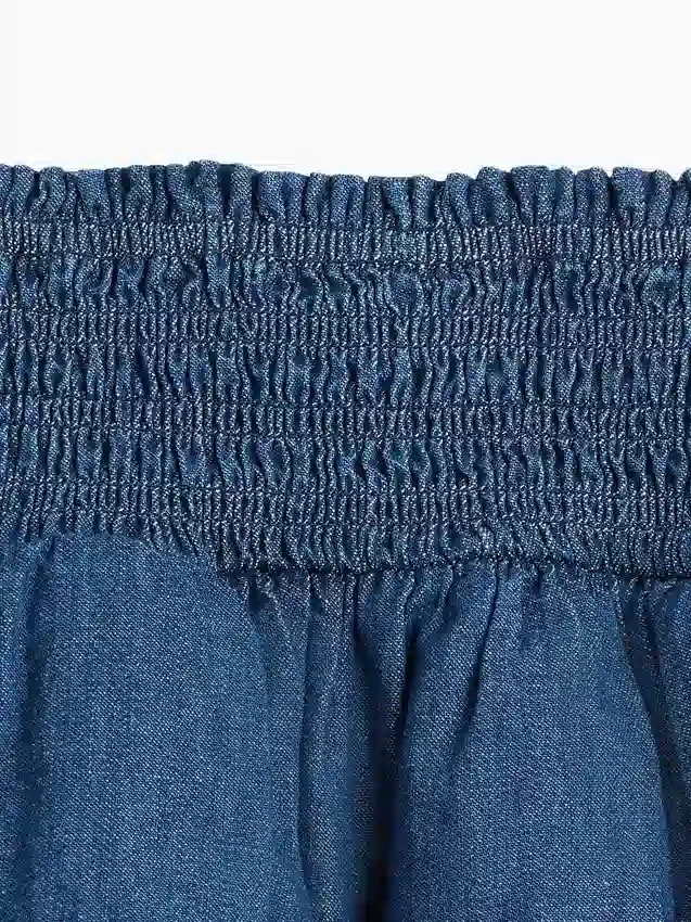Mini gonna-pantaloncino in denim per bambini con smock