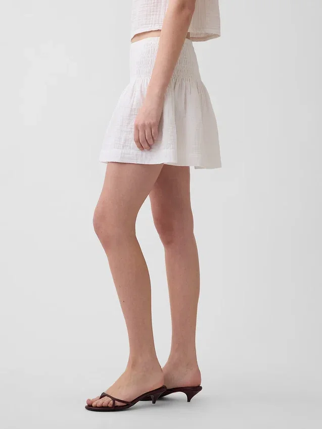 Mini gonna-pantaloncino in garza di cotone con vita smockata