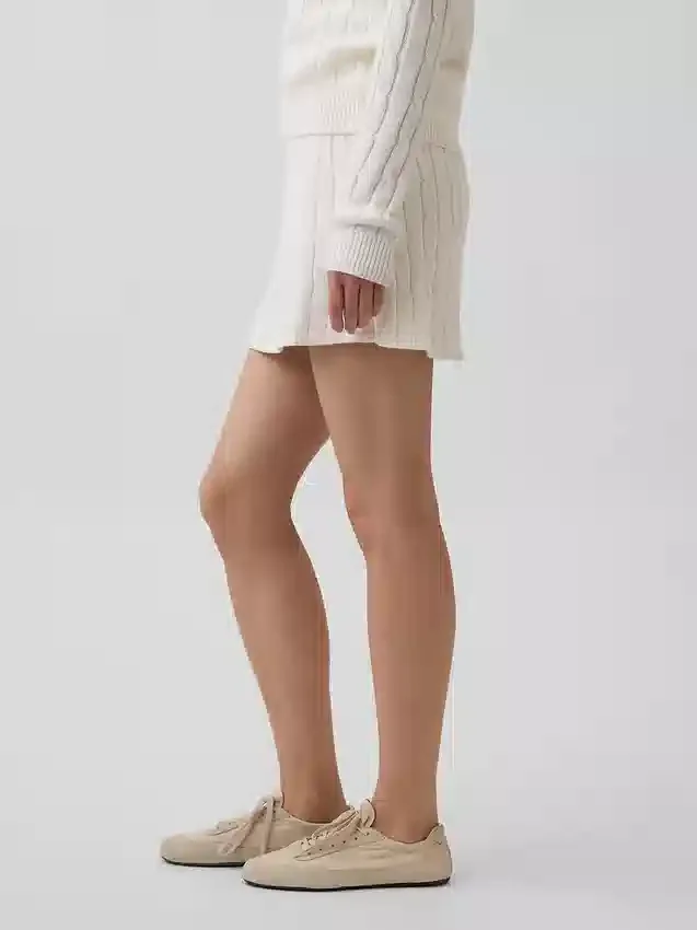 Mini gonna-pantaloncino in maglia a trecce 100% cotone