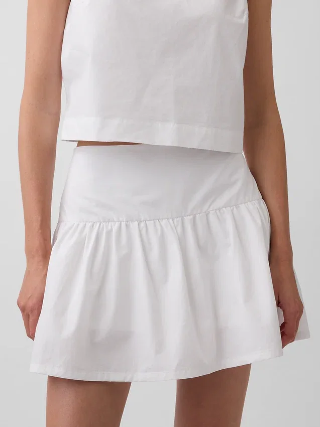 Mini gonna-pantaloncino in popeline a vita bassa