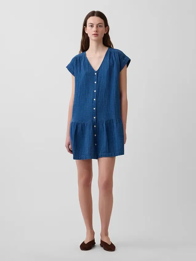 Miniabito a camicia in denim di garza di cotone con vita bassa