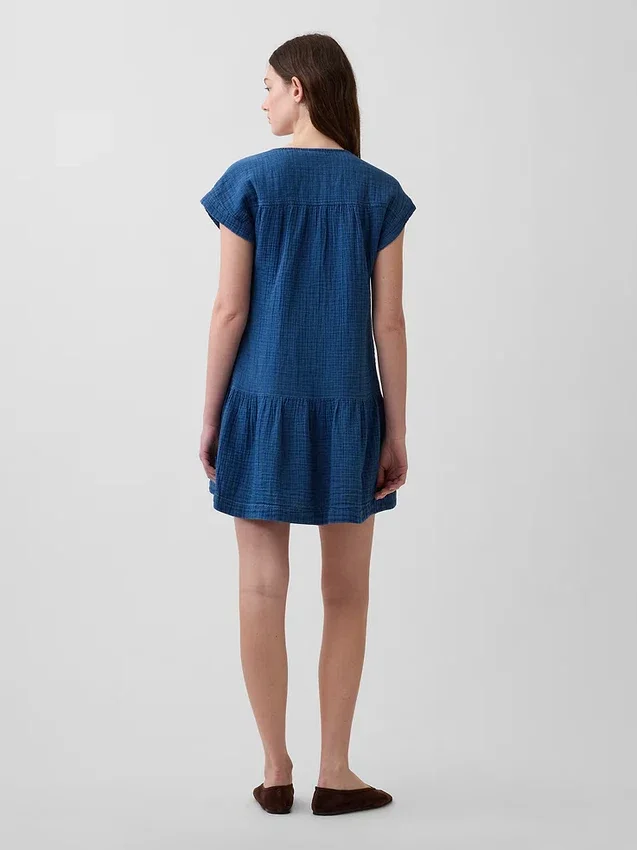 Miniabito a camicia in denim di garza di cotone con vita bassa