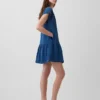 Miniabito a camicia in denim di garza di cotone con vita bassa