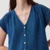 Miniabito a camicia in denim di garza di cotone con vita bassa