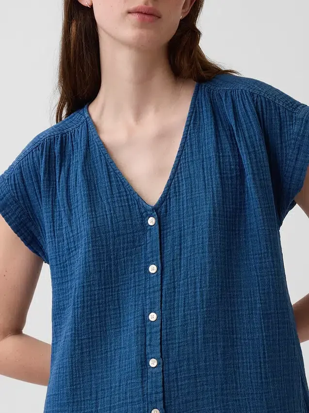 Miniabito a camicia in denim di garza di cotone con vita bassa