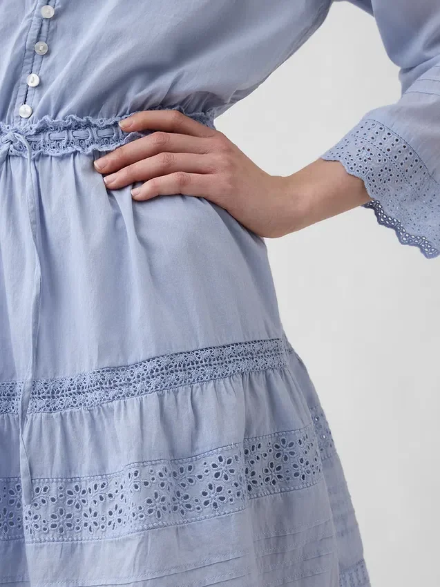 Miniabito con bordi in pizzo