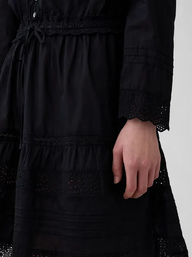 Miniabito con bordi in pizzo