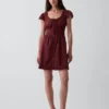 Minivestito con scollo rotondo e bordi in pizzo