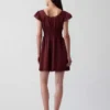 Minivestito con scollo rotondo e bordi in pizzo