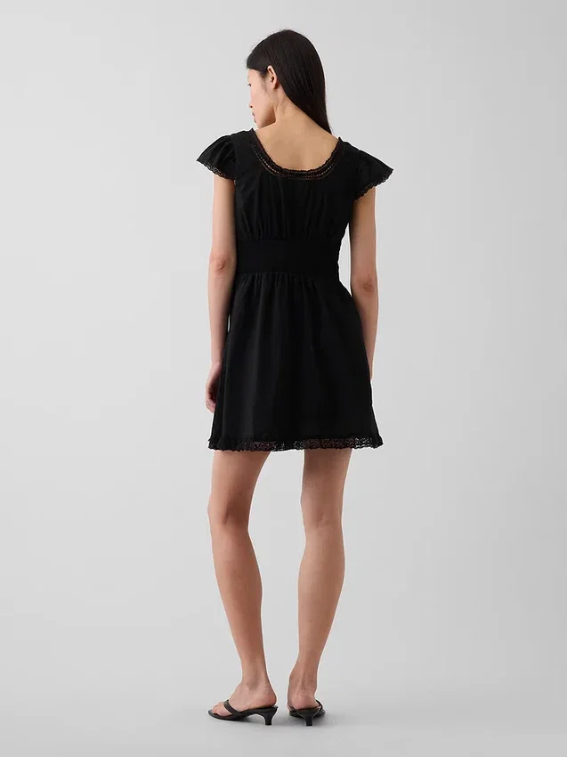 Minivestito con scollo rotondo e bordi in pizzo