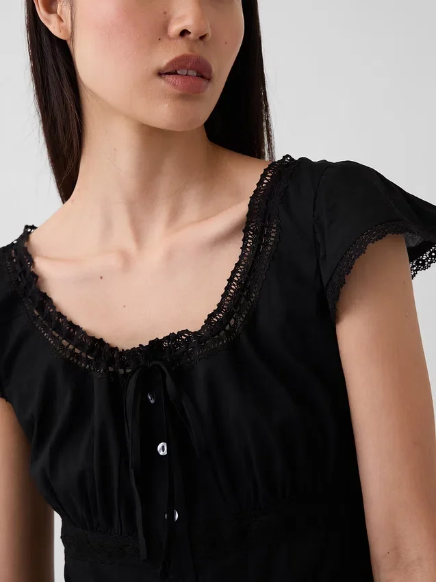 Minivestito con scollo rotondo e bordi in pizzo
