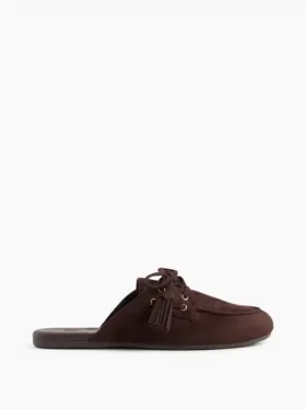 Mules vegane in pelle scamosciata con nappine