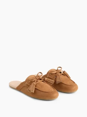 Mules vegane in pelle scamosciata con nappine
