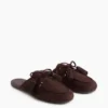Mules vegane in pelle scamosciata con nappine