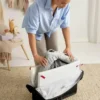 Pacchetto Babybjorn con lettino da viaggio Light e lenzuolo con angoli